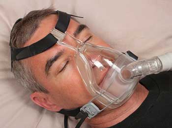 a man wearing a cpap device