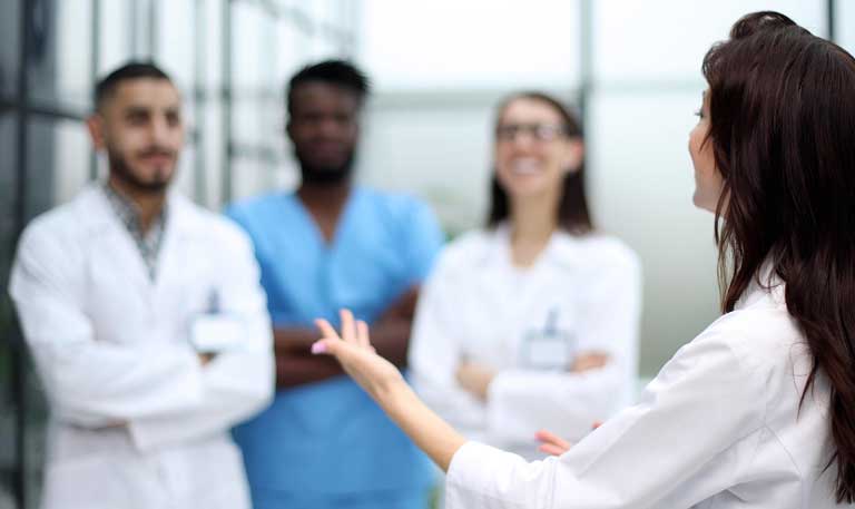 Group of medicine doctors talking during conference