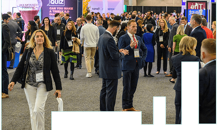 People stand in the Exhibit Hall at the CHEST Annual Meeting